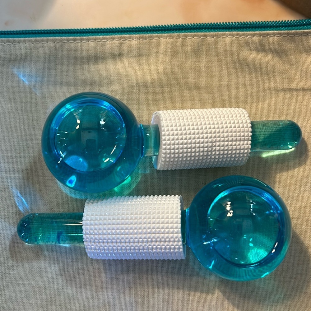 NWOT glass face massage globes